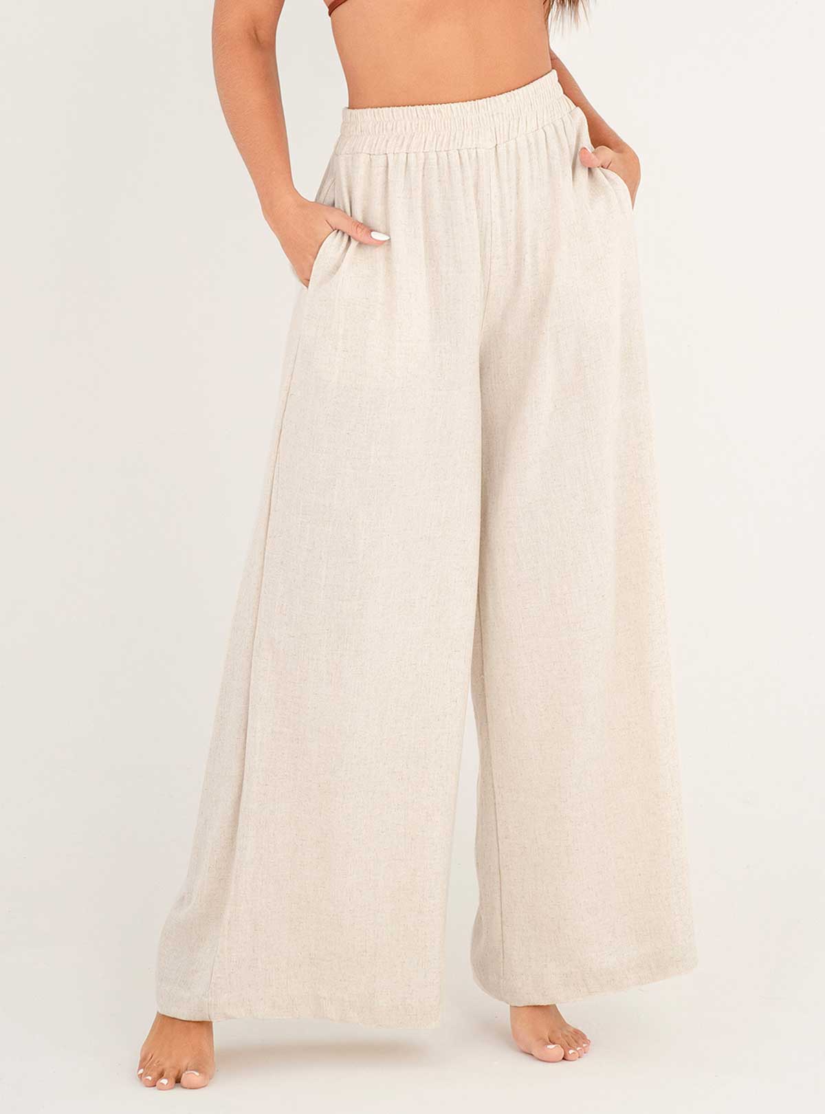 Pantalón con 2 bolsillos y resorte en cintura en tela lino viscosa 8091 marfil