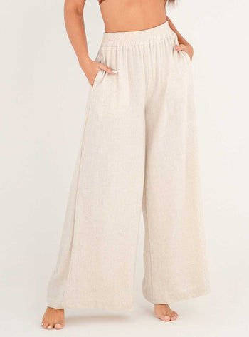 Pantalón con 2 bolsillos y resorte en cintura en tela lino viscosa 8091 marfil