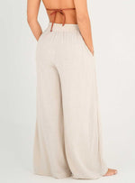 Pantalón con 2 bolsillos y resorte en cintura en tela lino viscosa 8091 marfil