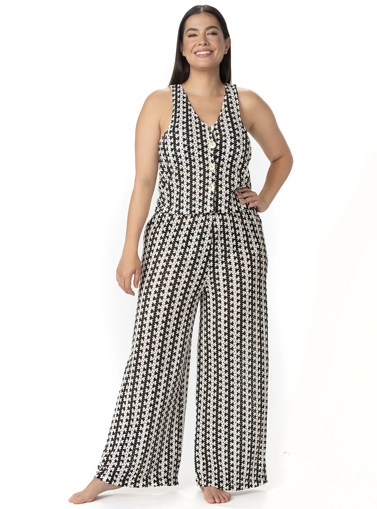 PANTALÓN EN CROCHET ZIGZAG NEGRO CON BOLSILLOS. 8200