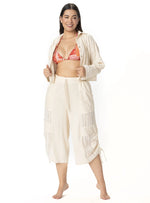 SHORT CON BOLSILLOS EN LINO SEMILLA 8189